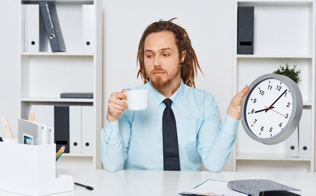 Business,Man,Sitting,At,His,Desk,Time,Official,Paperwork