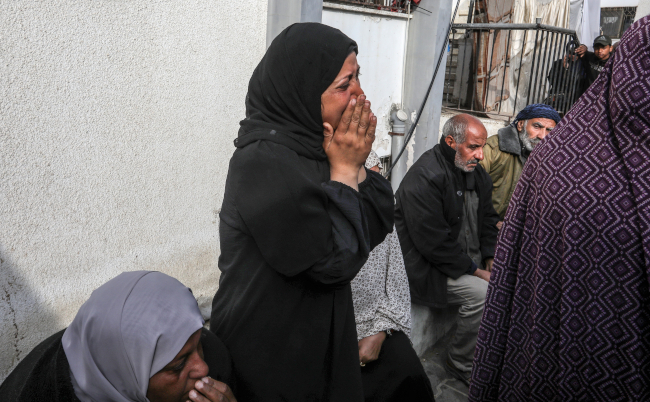 Displaced,Palestinians,Bid,Farewell,To,Their,Dead,Relatives,,At,Al-najjar