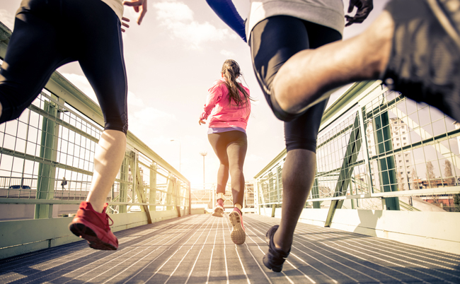 Three,Runners,Sprinting,Outdoors,-,Sportive,People,Training,In,A