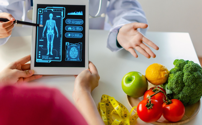 Nutritionist,Female,Doctor,Using,Digital,Mobile,Tablet,With,Virtual,Graphic