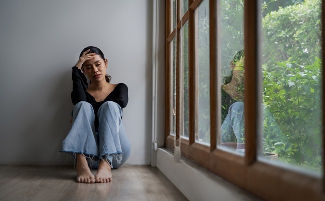 Depressed,Young,Asian,Woman,With,Mental,Health,Problem,In,Mind