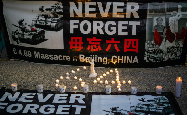 Participants,Attend,A,Candlelight,Vigil,Outside,The,Chinese,Consulate,General