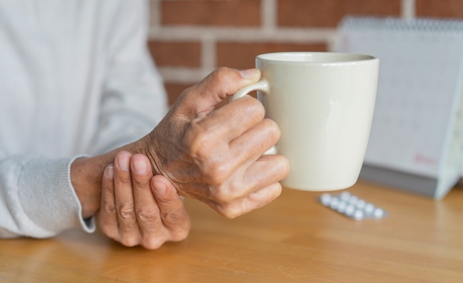 Close,Up,Senior,Woman,Hold,On,Hand,To,Relief,Shaky