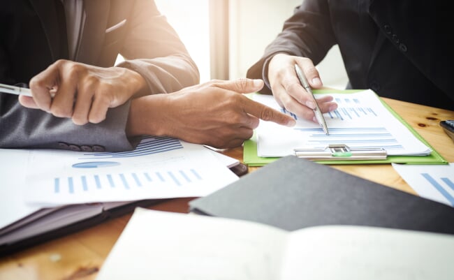 Co-workers,Are,Consultants,On,Business,Documents,,Tax,,Transactions,And,Business