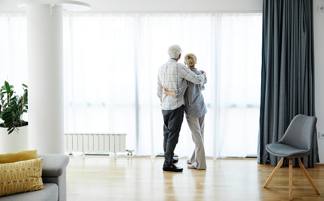 Portrait,Of,A,Lonely,Senior,Couple,Embracing,Hugging,And,Looking