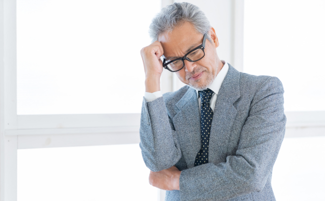 Portrait,Of,Senior,Asian,Businessman,think