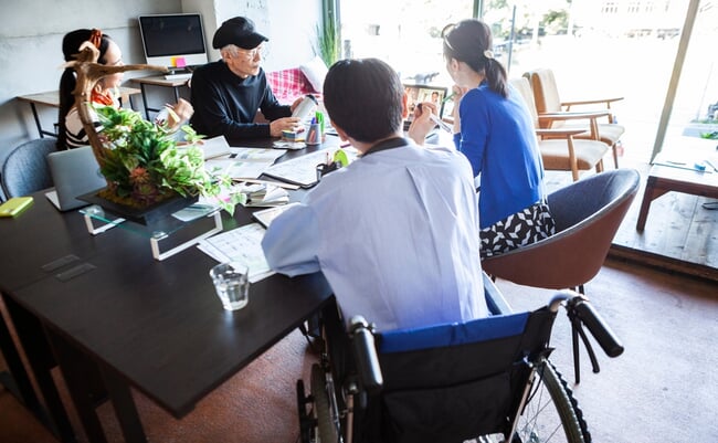 Online,Meeting,At,Diversity,Company,Where,Young,Employees,In,Wheelchairs