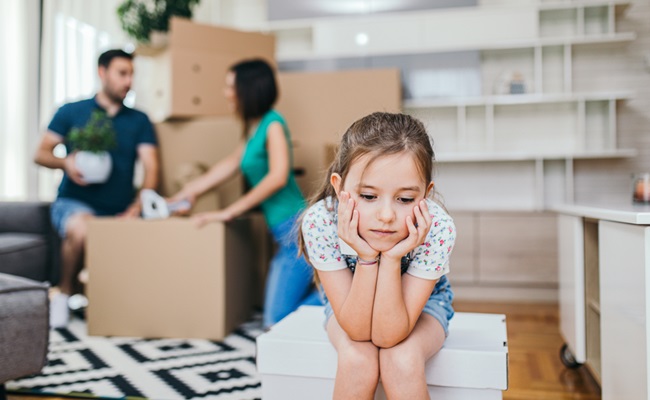 Family,Moving,To,Their,New,Home,And,Sad,Girl,Sitting