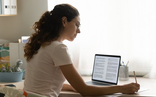 Confident,Female,Interpreter,Translate,Document,From,Foreign,Language,To,English