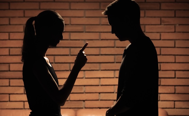 Woman,Wife,Pointing,Finger,Scolding,,Nagging,Her,Husband,Man.,Bar