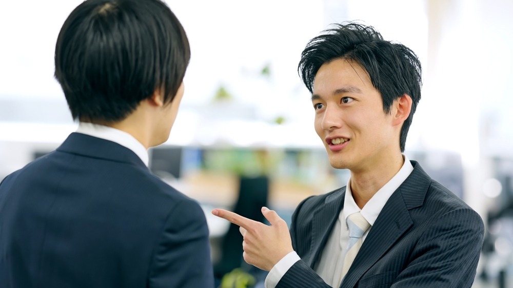 Two,Asian,Businessmen,Arguing,In,A,Modern,Office.
