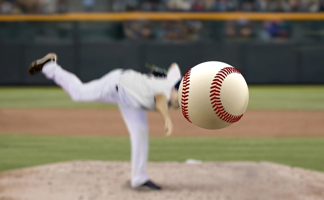 Baseball,Pitcher,Throwing,Fast,Ball,To,Batter,In,A,Stadium