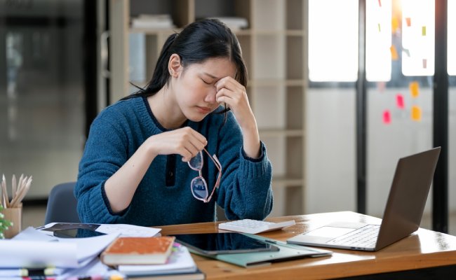 Frustrated,Young,Woman,Feeling,Tired,And,Stressed,,Keeping,Eyes,Closed