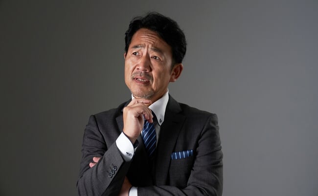 Asian,Middle,Aged,Businessman,Having,Trouble,In,Black,Background