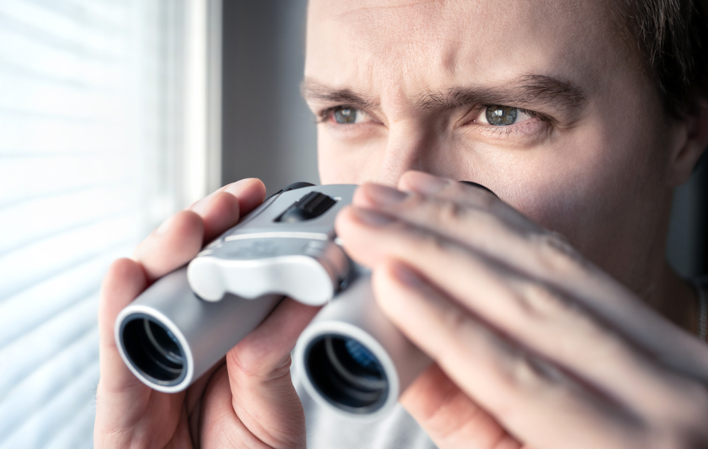 Man,With,Binoculars.,Private,Detective,,Agent,Or,Investigator,Looking,Out
