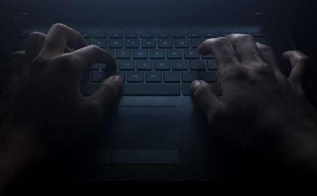 Close,Up,Man,Hand,Typing,Keyboard,On,Laptop,In,Darkness
