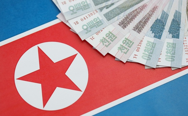 North,Korean,Won,Money,Bills,In,Big,Amount,Lies,On
