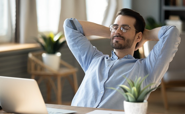 Calm,Millennial,Man,In,Glasses,Sit,Relax,At,Home,Office