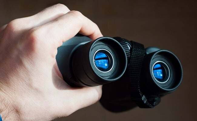 Hand,Of,Boy,Or,Man,Holding,Binoculars