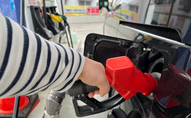 Regular,Gasoline,Filling,Gun,At,A,Gas,Station,In,Japan.