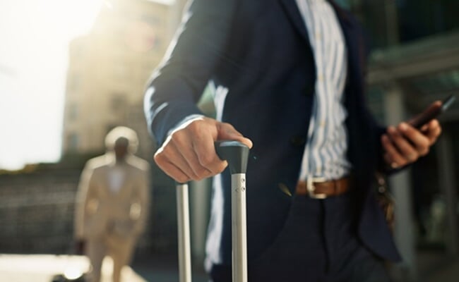 Business,Man,,Phone,And,Suitcase,In,Street,,Hands,And,Search