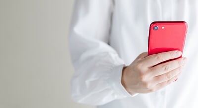 Woman's,Hand,Holding,A,Smartphone