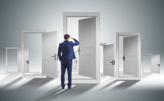 Businessman,Facing,Many,Business,Opportunities