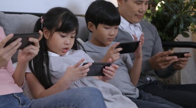 Family,Concept.,Families,Playing,Cell,Phones,Without,Paying,Attention,To