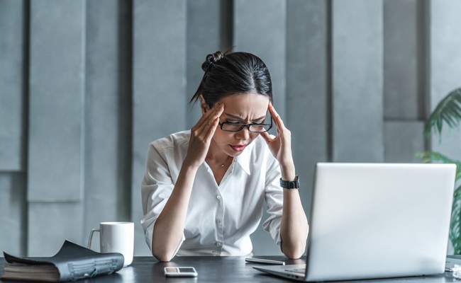 Young,Woman,Working,On,Laptop,Having,Headache.,Bored,Workaholic,Female