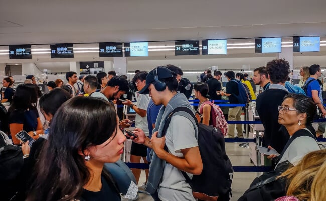 Tokyo,,Japan,-,July,22,2024:,Crowds,Of,Tourists,Lining