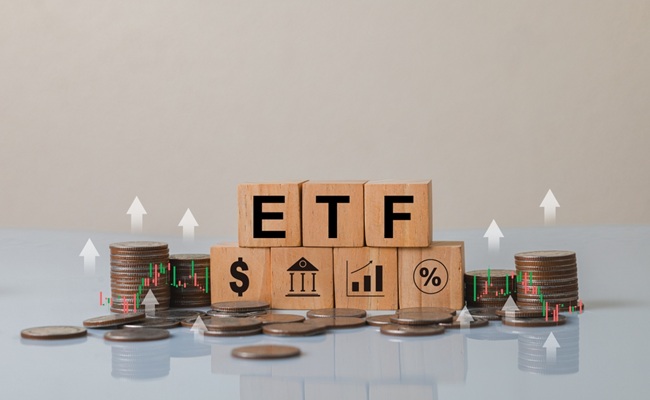 This,Image,Showcases,Wooden,Blocks,Spelling,Etf,,Surrounded,By,Coins