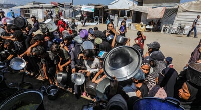 Palestinians,Receive,Hot,Meals,(tekkiyeh),From,A,Charity,Kitchen,,Distributed
