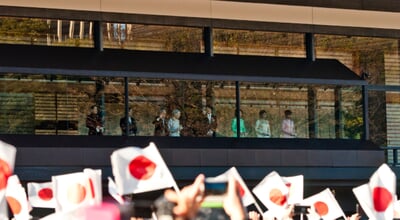 Tokyo,/,Japan,-,01.02.2019:,Crowds,Waiving,Paper,Flags,As