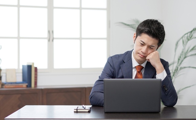 A,Businessman,Worried,In,Front,Of,A,Computer