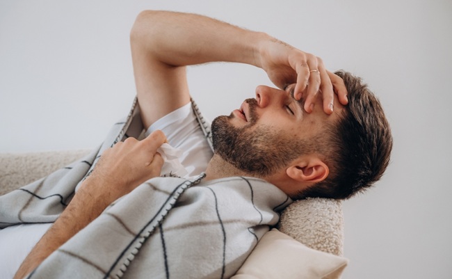 On,The,Bed.,Sick,Man,Is,Feeling,Bad,At,Home.