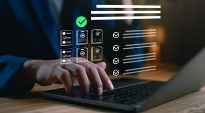 Digital,Checklist,And,Task,Management,Concept.,Businessperson,Using,A,Laptop