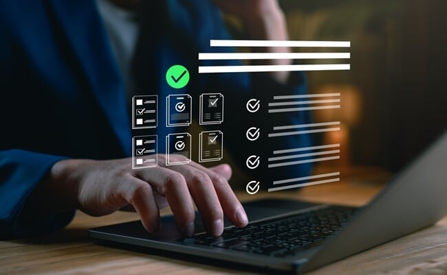 Digital,Checklist,And,Task,Management,Concept.,Businessperson,Using,A,Laptop