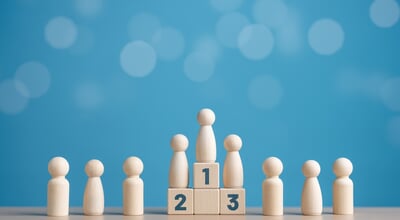 Wooden,Human,Figures,Standing,On,The,Podium,With,Ranking,For