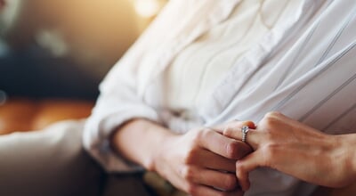 Wedding,Ring,,Anxiety,And,Hands,Of,Woman,On,Sofa,For