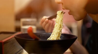 A,Girl,Eating,Japanese,Noodles,In,Japanese,Restaurant