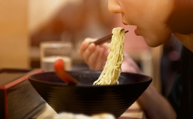 A,Girl,Eating,Japanese,Noodles,In,Japanese,Restaurant