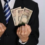 Businessman,Doing,A,Guts,Pose.,Translation:manufactured,By,The,National,Printing