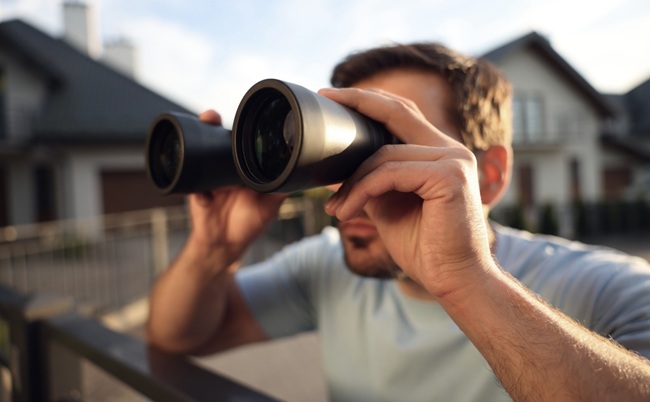 Concept,Of,Private,Life.,Curious,Man,With,Binoculars,Spying,On