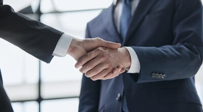 People,Shaking,Hands,At,Meeting,Close,Up