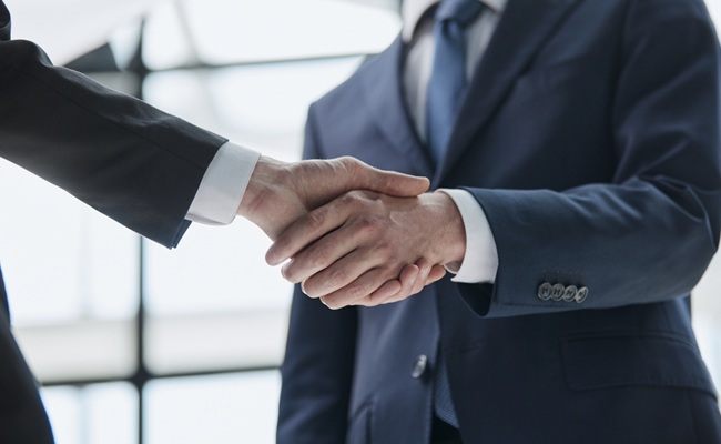 People,Shaking,Hands,At,Meeting,Close,Up