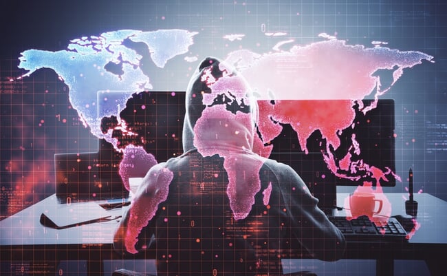 Hacker,In,A,Hoodie,Using,A,Computer,With,A,Digital