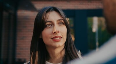 Portrait,Of,Pretty,Caucasian,Woman,Talking,With,Someone,At,Street.
