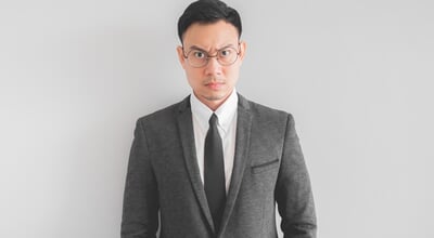 Angry,Asian,Boss,Manager,Businessman,In,Black,Suite.