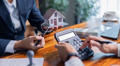 Businessperson,Decided,To,Buy,New,Home,,Securing,Loan,To,Finance