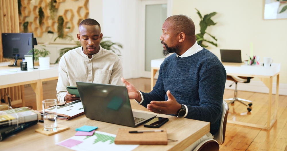 Business,,People,And,Meeting,On,Laptop,In,Office,Of,Training